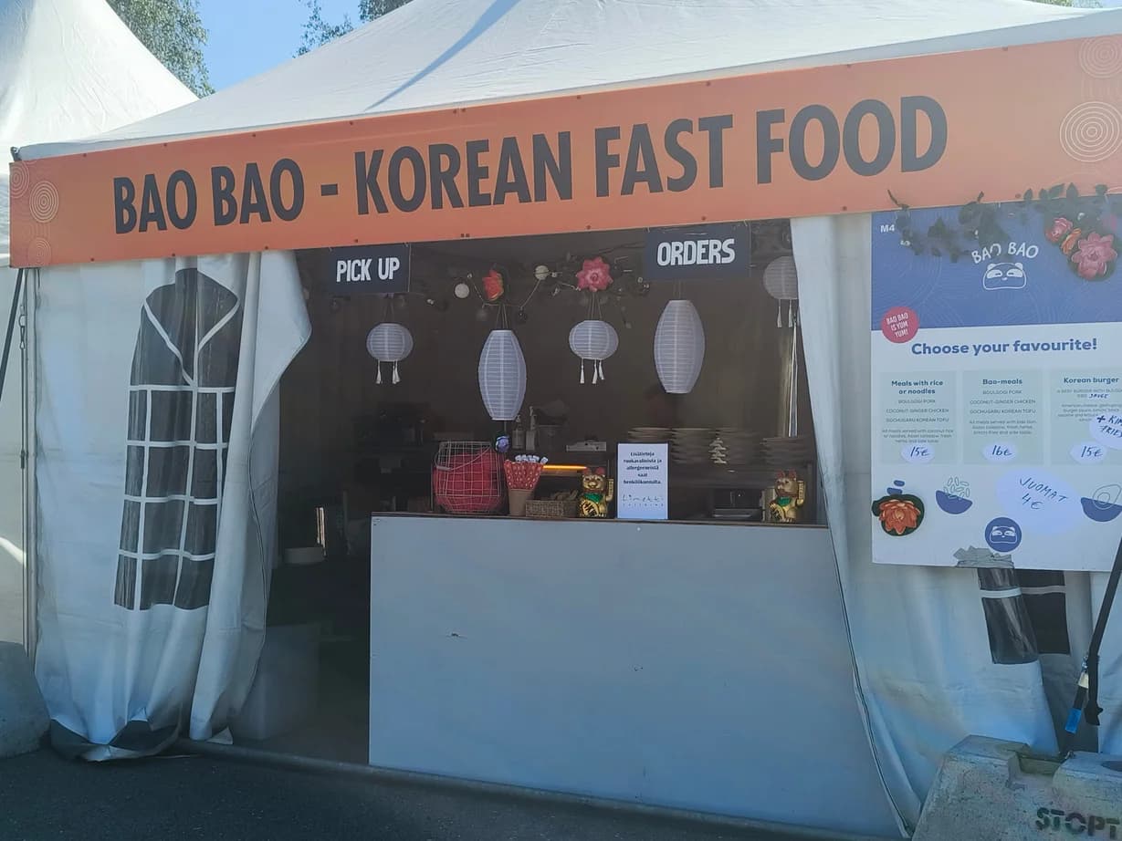 Bao Bao festival stall with order and pickup counters and original panda signage